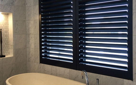 Hardwood-Shutters-Black-Bathroom– Signature Shutters and BlindsS
