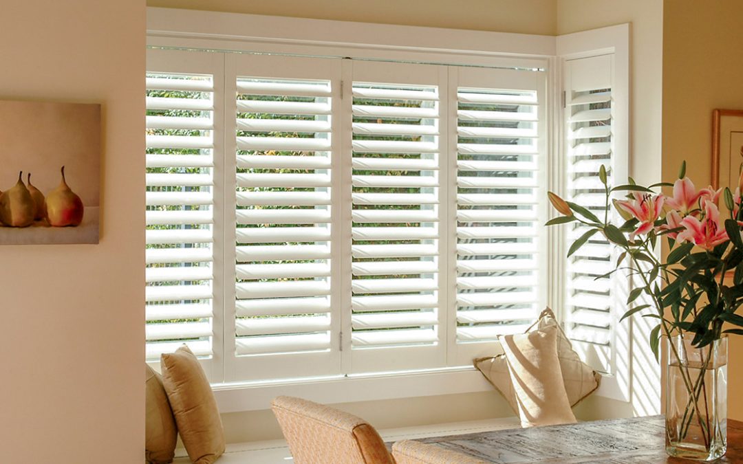 Hardwood Shutters – Bi-Folding in Bay Window