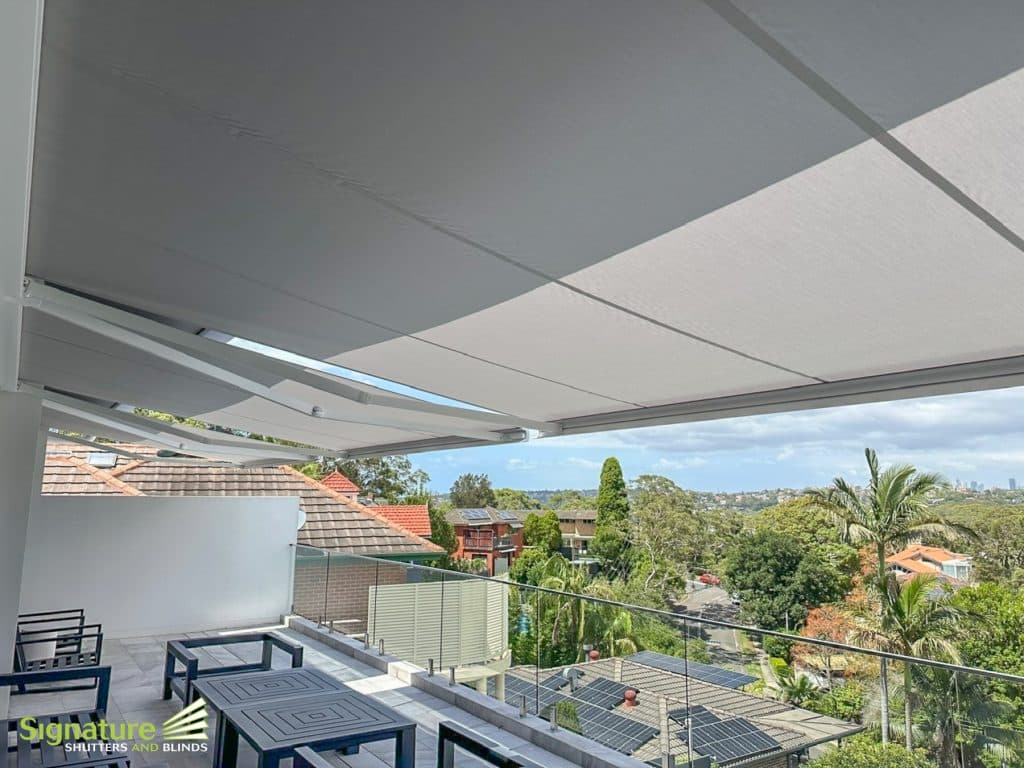Folding Arm Awnings Side by Side on Balcony