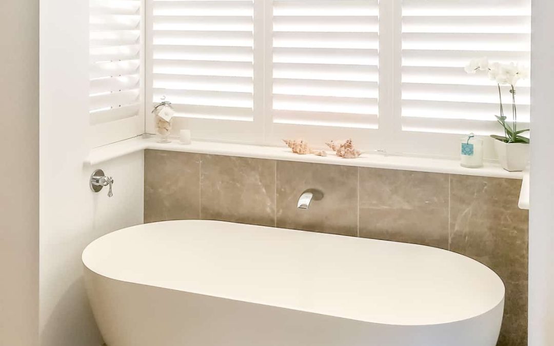 Hardwood Shutters in Bathroom – Coner Window