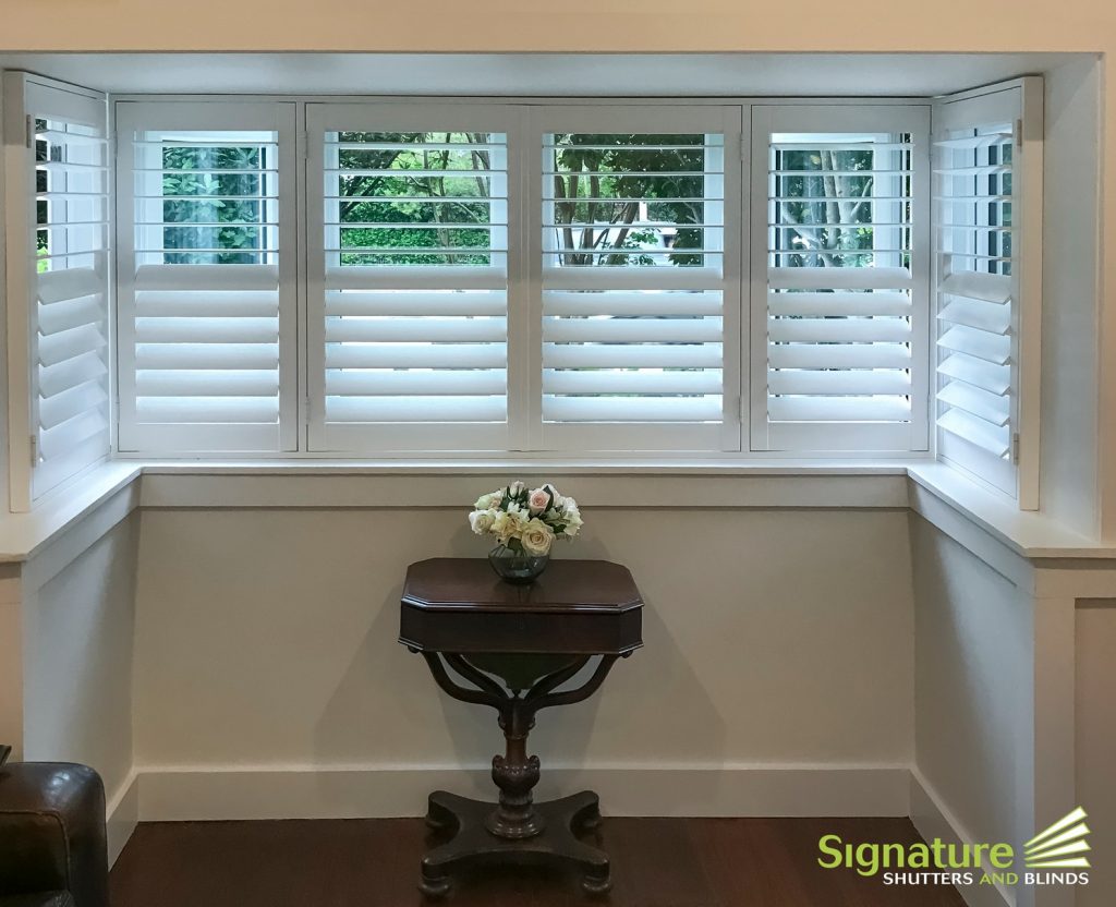 Plantation Shutters on Bay Window, Hinged in L-Frame